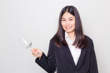 Güzel Asya iş kız dinlenmek için d kırmızı şarap ile