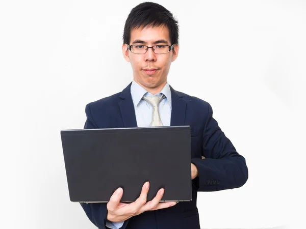 Asiático hombre de negocios usar gafas en profesional traje con un lapt —  Fotos de Stock