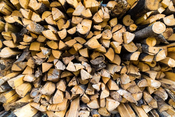 Row of fire wood stock for winter — Stock Photo, Image