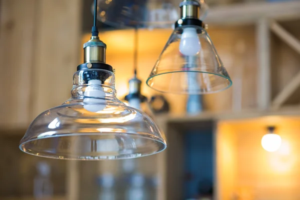 Vintage warm light bulbs on coffee shop background, Light bulb decor