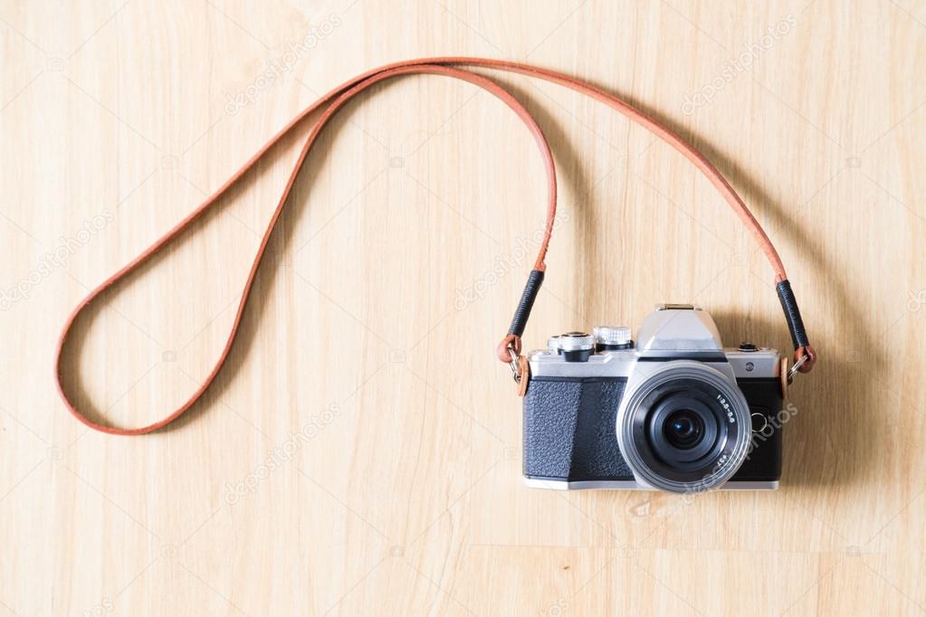 Genuine camera strap handmade with thread on leather