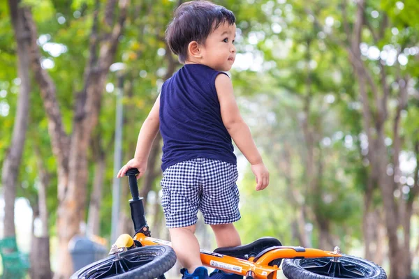 Adorable Young Boy Riding Bikes City Park Asphalt Road Blurred — Stock Photo, Image