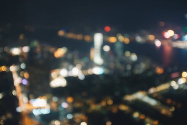 Hong Kong şehir gece görüşü Bokeh, Kowloon bölgesi ile soyut bulanıklaştı