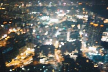 Hong Kong şehir gece görüşü Bokeh, Kowloon bölgesi ile soyut bulanıklaştı