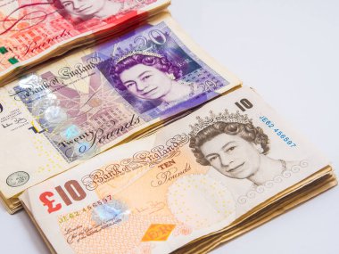 Beyaz arkaplan finans kavramına Pound GBP parası