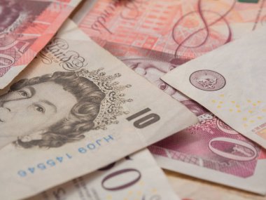 Beyaz arkaplan finans kavramına Pound GBP parası