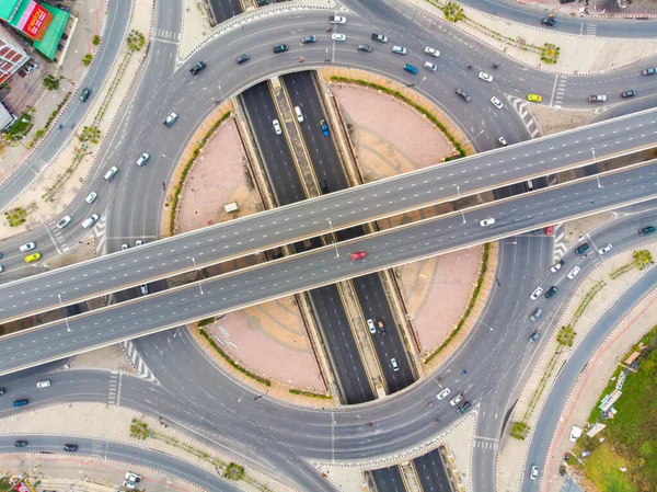 Circular junction cross transport road with car movement aerial view