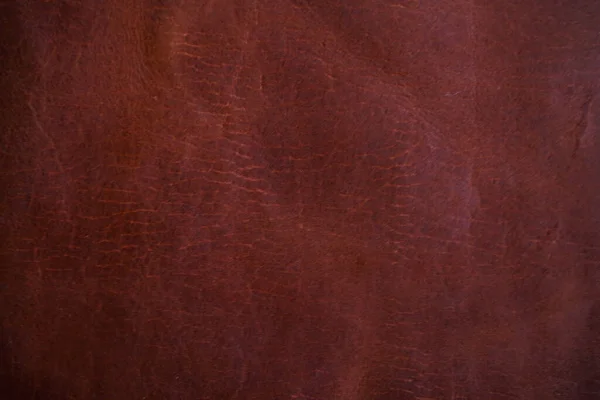 Red dark brown vegetable tanned leather background abstract leather product