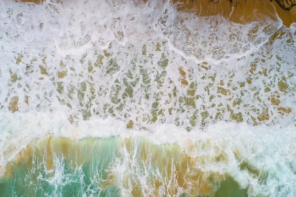 Beautiful sea wave white sand beach aerial view big serve wave in Phuket Thailand