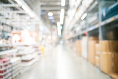 Bokeh iş geçmişine sahip soyut bulanık market rafı