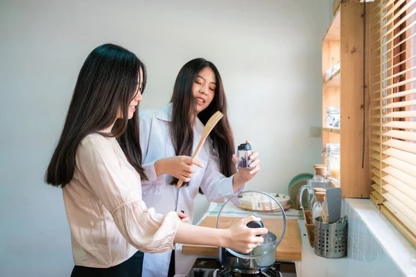 Beautiful Asian Casual Girl Tasting Food Smiling While Cooking Kitchen — Foto de Stock