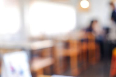 Bulanık kahve dükkanı ya da kafeterya soyut Bokeh aydınlık resim arkaplanı, ürün görüntüleme ya da tasarım anahtar görsel düzenine sahip