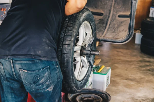 Car tires chang in the auto repair service store center transport service industry