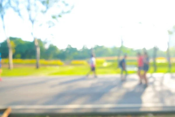 Abstrakte Verschwommene Straße Park Morgen Sonne Licht Grünen Baumhintergrund — Stockfoto