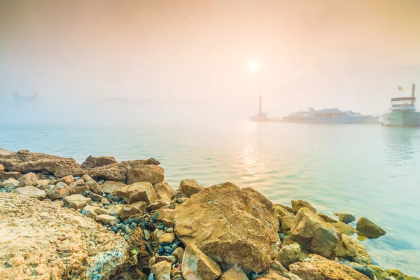 Sun Moon Lake at morning with fog