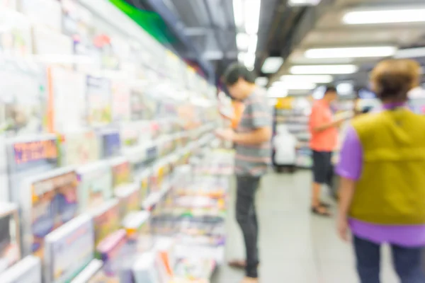 Abstract blurred people walking in book store — Stock Photo, Image