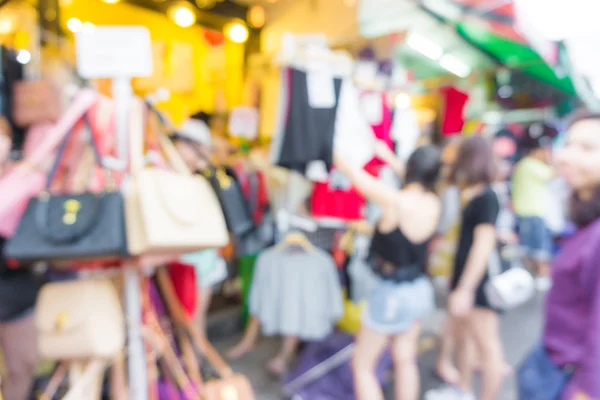 Abstrato pessoas desfocadas compras no mercado Jatujak — Fotografia de Stock