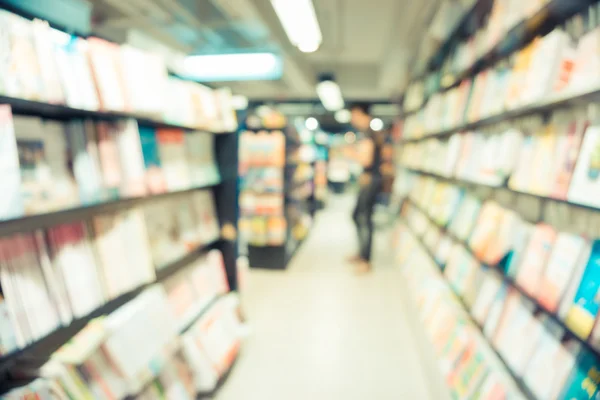 Abstract blurred people walking in book shopping center