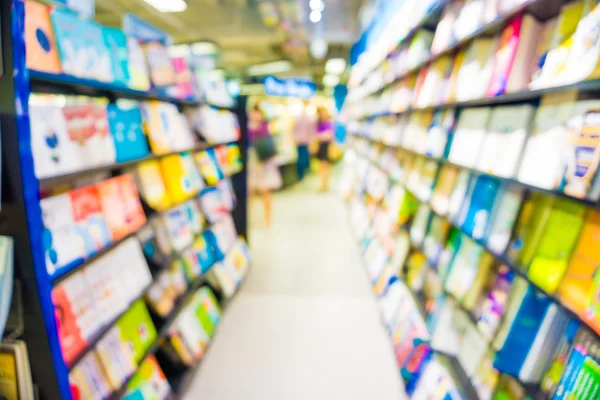 Abstract blurred people walking in book shopping center — Stock Photo, Image