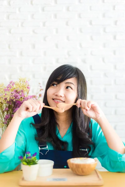 Happy Asian girl with ice cream look joyful and cheerful. — Stock Photo, Image