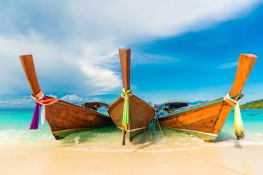 Traditional longtail boats in the famous Lipe island clipart