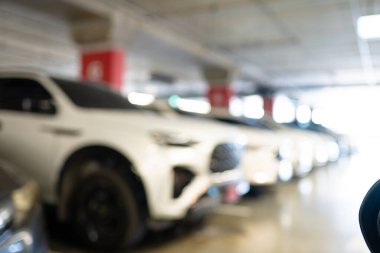 Soyut bulanık boş modern araba otoparkı iç market mağaza taşımacılığı arkaplanı