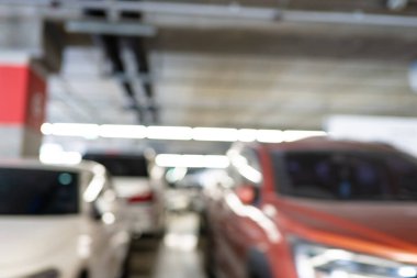 Soyut bulanık boş modern araba otoparkı iç market mağaza taşımacılığı arkaplanı
