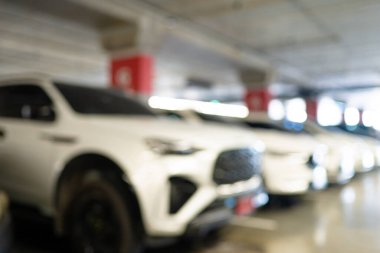 Soyut bulanık boş modern araba otoparkı iç market mağaza taşımacılığı arkaplanı
