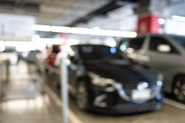 Soyut bulanık boş modern araba otoparkı iç market mağaza taşımacılığı arkaplanı