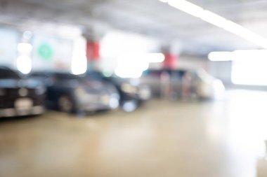 Soyut bulanık boş modern araba otoparkı iç market mağaza taşımacılığı arkaplanı