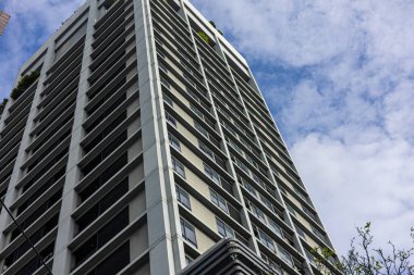 Şehir merkezindeki Bangkok Tayland 'da modern yüksek katlı apartman sakinleri