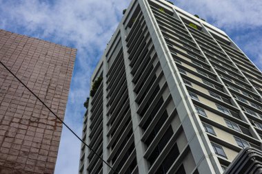 Şehir merkezindeki Bangkok Tayland 'da modern yüksek katlı apartman sakinleri