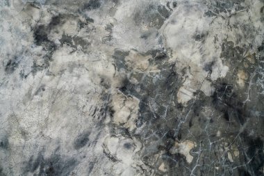 Arkaplan için soyut koyu gri beton yapı duvarı