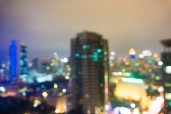 Város: éjszakai elmosódott kép — Stock Fotó