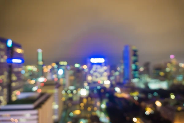 Város: éjszakai elmosódott kép — Stock Fotó