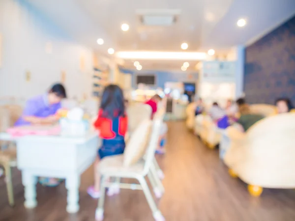 Koffie winkel met mensen achtergrond wazig — Stockfoto