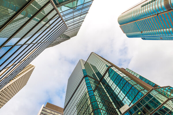 Uprisen angle modern business center in hongkong with sky