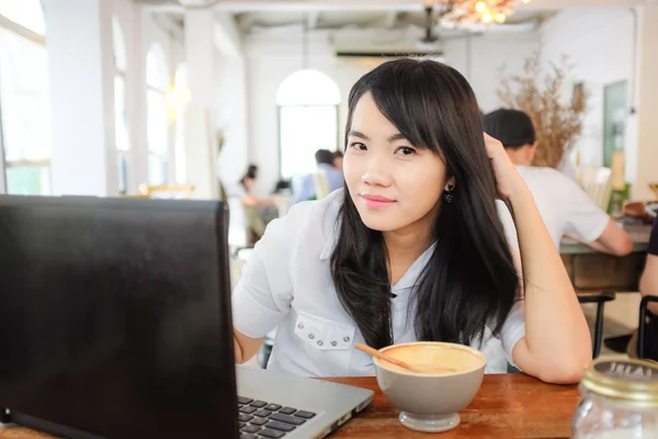 Young smart female student use laptop computer — Stock Photo, Image