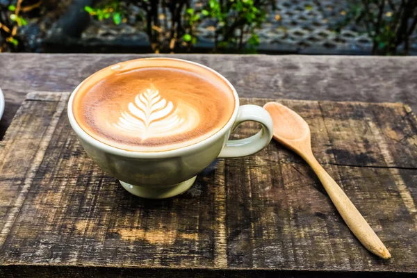 Koffiekopje latte art — Stockfoto