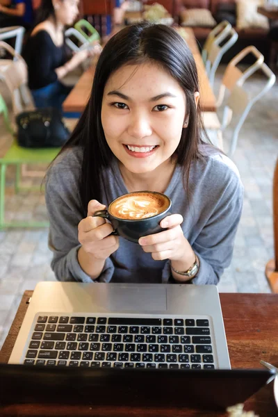 Stock image Business smiling woman working on Laptop In Coffee Shop, Cute business asian women