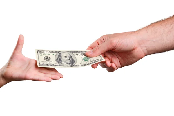 Man's hand gives a the bill 100 US dollars in a child's hand — Stock Photo, Image