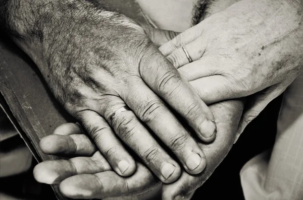 Monochrome image of old married couples hands. horizontal Stock Photo