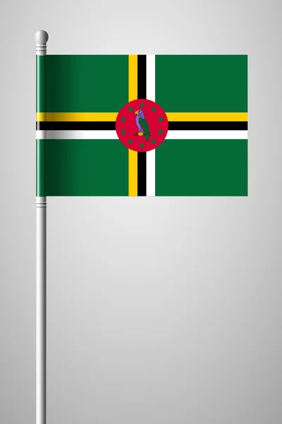 Flagga Dominica. Flaggan på flaggstången — Stock vektor