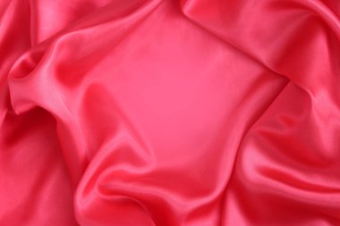 Güzel pliseli kırmızı saten kumaş. İpek, saten, doğal kumaş. Doku, duvar kağıdı.