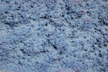 Dekoratif gri arka plan. Stucco duvarı. Yapay kaba biçimlendirilmiş yapı. 