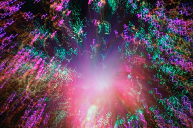 Büyük patlama. Genişleyen evren. Havai fişek patlaması. Soyutlama. Merkezden saçılan çok renkli kıvırcık iplikler. Aydınlatılmış optik fiber.
