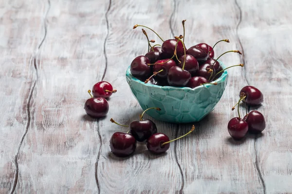 Cherries in a bowl with water drops — Stock Photo, Image