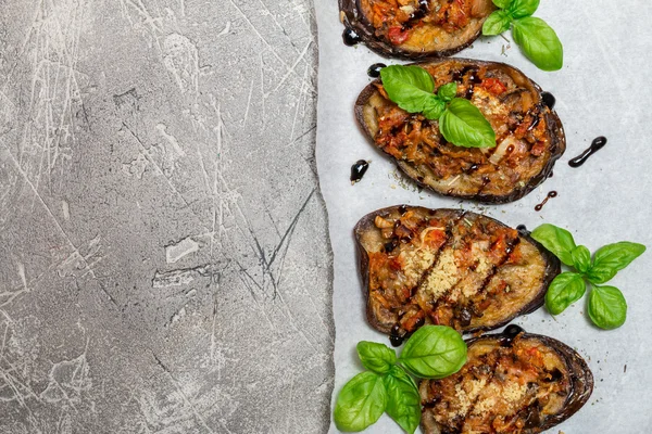 Baked eggplant stuffed with vegetables and cheese — Stock Photo, Image