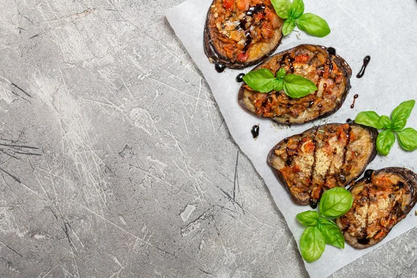 Baked eggplant stuffed with vegetables and cheese — Stock Photo, Image