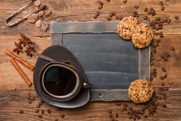 Cup of coffee and chalk board menu — Stock Photo, Image